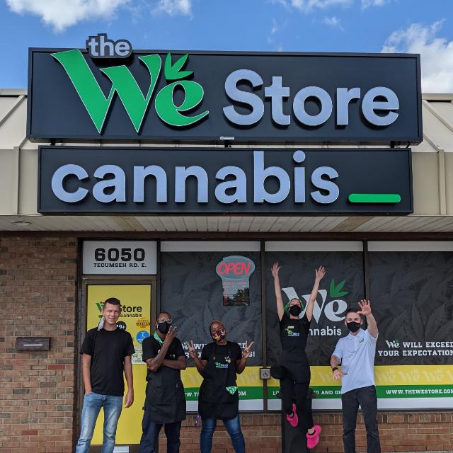 The WeStore team outside the Tecumseh Road store